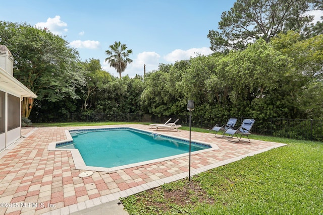 2478 Country Club Blvd, Orange Park, FL 32073 - view of pool with a patio, a sunroom, and view of wooded area