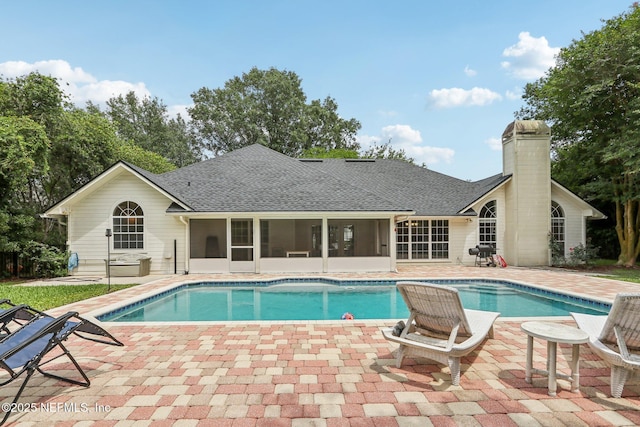 2478 Country Club Blvd, Orange Park, FL 32073 - swimming pool featuring a sunroom and a patio area