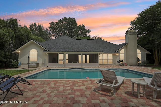 2478 Country Club Blvd, Orange Park, FL 32073 - outdoor pool with a sunroom and a patio area