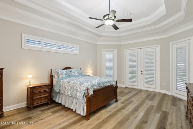 182 Malley Cove Ln, Fleming Island, FL 32003 - bedroom featuring access to outside, a raised ceiling, light wood-type flooring, ornamental molding, and ceiling fan