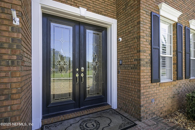 8135 Wekiva Way, Jacksonville, FL 32256 - property entrance featuring french doors and brick siding
