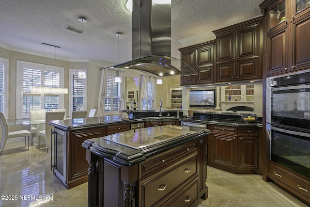 8135 Wekiva Way, Jacksonville, FL 32256 - kitchen featuring island range hood, double wall oven, electric stovetop, a peninsula, and ornamental molding