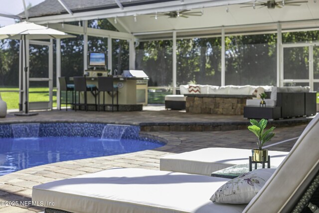 8135 Wekiva Way, Jacksonville, FL 32256 - swimming pool featuring a ceiling fan, an outdoor living space, a patio area, and an outdoor bar