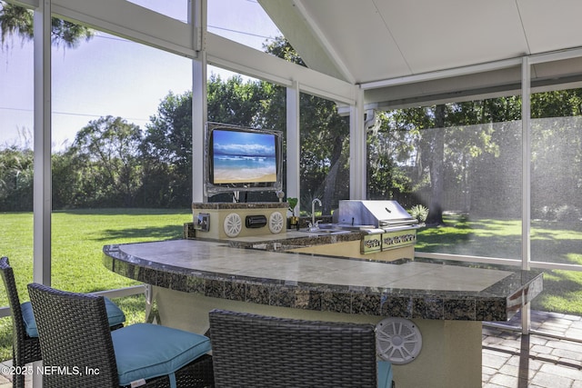 8135 Wekiva Way, Jacksonville, FL 32256 - sunroom with healthy amount of natural light, an outdoor kitchen, and vaulted ceiling