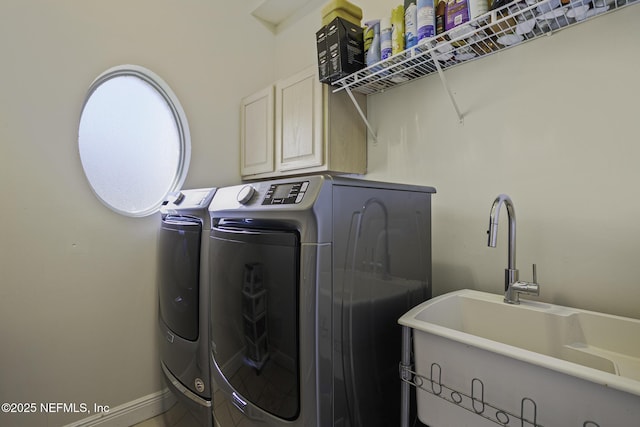 8135 Wekiva Way, Jacksonville, FL 32256 - laundry room with washing machine and dryer and cabinet space