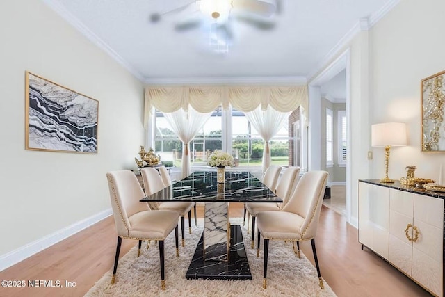 8135 Wekiva Way, Jacksonville, FL 32256 - dining space featuring crown molding, baseboards, plenty of natural light, and light wood finished floors