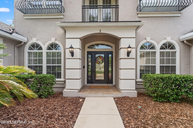1612 Inkberry Ln, Saint Johns, FL 32259 - entrance to property with a balcony and stucco siding