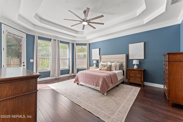 1612 Inkberry Ln, Saint Johns, FL 32259 - bedroom featuring a raised ceiling, dark wood-style floors, access to outside, a ceiling fan, and a textured ceiling