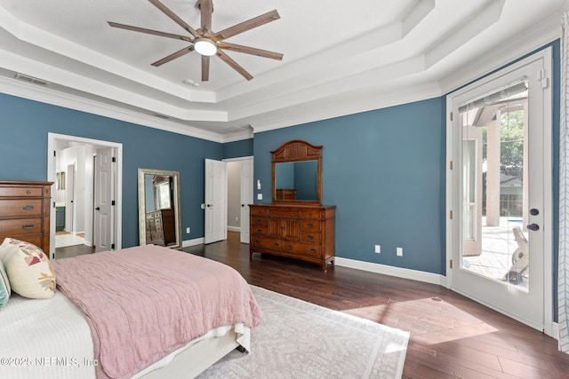 1612 Inkberry Ln, Saint Johns, FL 32259 - bedroom featuring a tray ceiling, access to exterior, wood finished floors, a ceiling fan, and ornamental molding