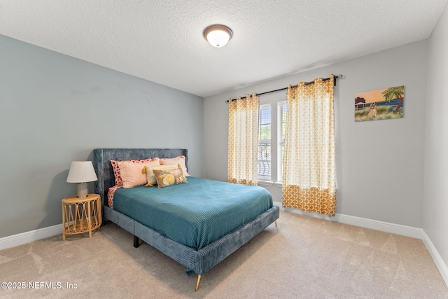 1612 Inkberry Ln, Saint Johns, FL 32259 - carpeted bedroom with a textured ceiling and baseboards