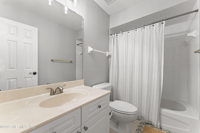 1612 Inkberry Ln, Saint Johns, FL 32259 - bathroom with vanity, shower / tub combo with curtain, tile patterned floors, and a textured ceiling