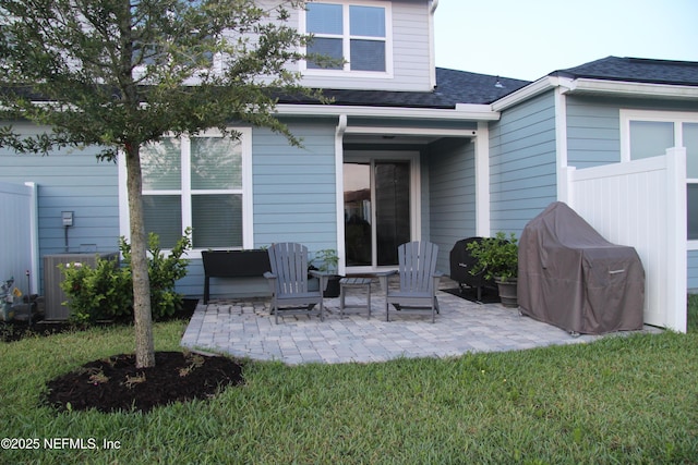 760 Cherry Elm Dr, Saint Augustine, FL 32092 - back of house with a patio, a shingled roof, and central air condition unit