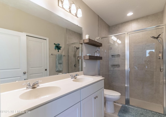 760 Cherry Elm Dr, Saint Augustine, FL 32092 - bathroom featuring toilet, a stall shower, double vanity, and tile patterned floors