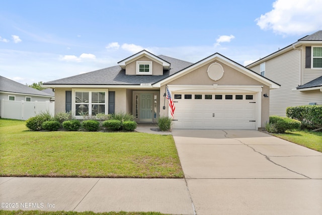 11521 Dunforth Cove Dr, Jacksonville, FL 32218 - traditional home with stucco siding, a garage, driveway, and roof with shingles