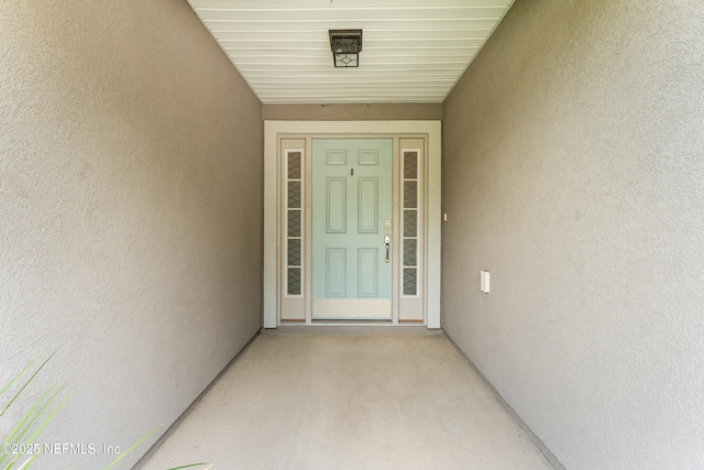 11521 Dunforth Cove Dr, Jacksonville, FL 32218 - entrance to property featuring stucco siding