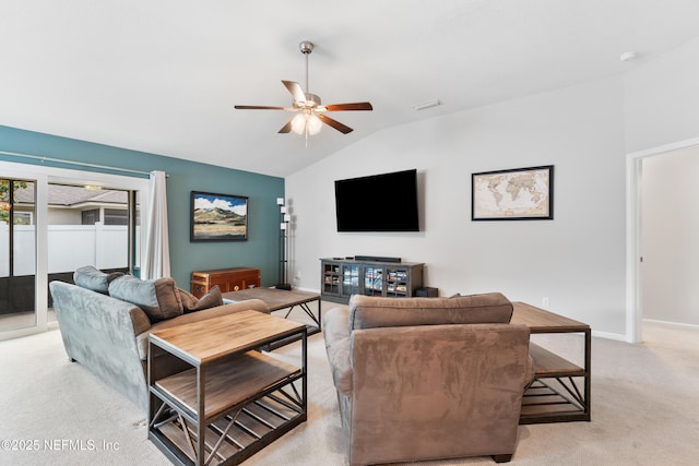 11521 Dunforth Cove Dr, Jacksonville, FL 32218 - living area with vaulted ceiling, ceiling fan, light colored carpet, and baseboards
