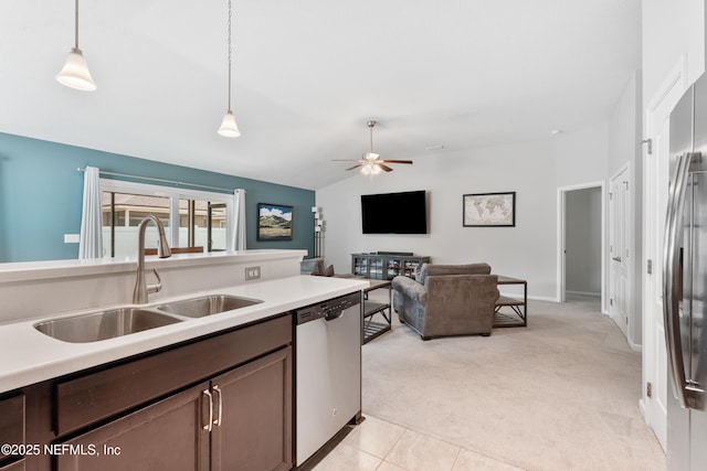 11521 Dunforth Cove Dr, Jacksonville, FL 32218 - kitchen with stainless steel appliances, a sink, lofted ceiling, decorative light fixtures, and ceiling fan