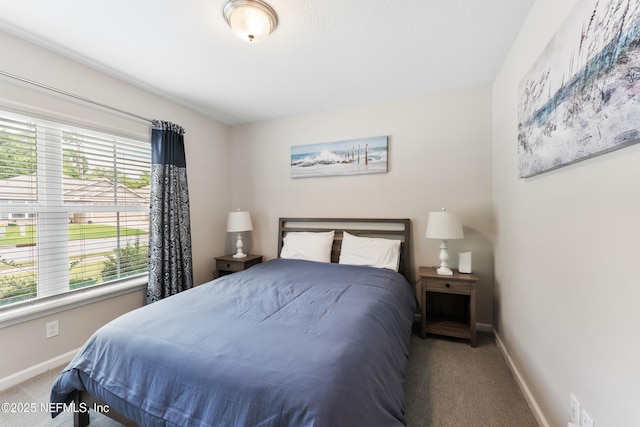 11521 Dunforth Cove Dr, Jacksonville, FL 32218 - carpeted bedroom featuring baseboards