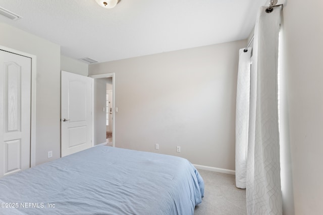 11521 Dunforth Cove Dr, Jacksonville, FL 32218 - bedroom with light colored carpet and baseboards