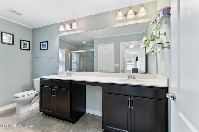 11521 Dunforth Cove Dr, Jacksonville, FL 32218 - full bath featuring double vanity, a shower stall, toilet, crown molding, and tile patterned flooring
