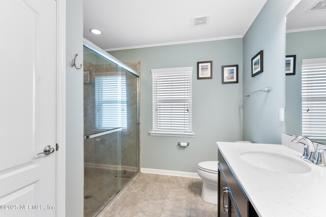 11521 Dunforth Cove Dr, Jacksonville, FL 32218 - bathroom with vanity, toilet, a stall shower, baseboards, and ornamental molding