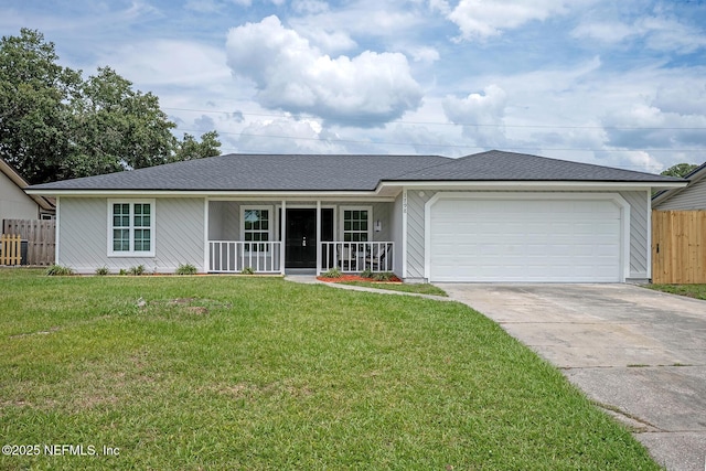 1798 Shannon Lake Dr, Middleburg, FL 32068 - ranch-style home featuring concrete driveway, a garage, covered porch, and a shingled roof