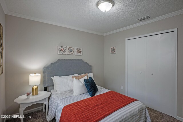 1798 Shannon Lake Dr, Middleburg, FL 32068 - carpeted bedroom with a closet, ornamental molding, and a textured ceiling