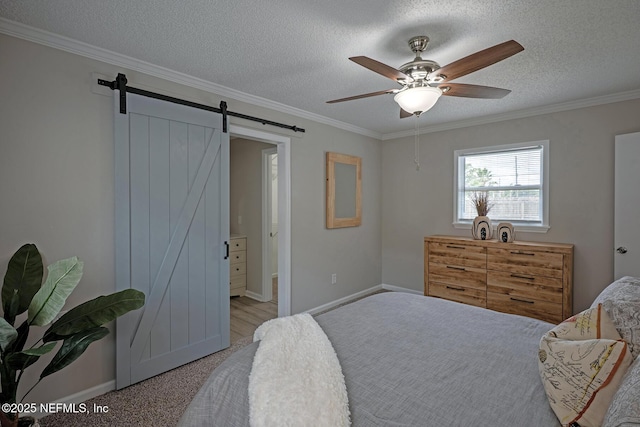 1798 Shannon Lake Dr, Middleburg, FL 32068 - bedroom featuring a barn door, crown molding, a textured ceiling, baseboards, and ceiling fan
