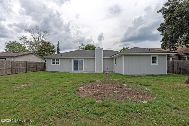 1798 Shannon Lake Dr, Middleburg, FL 32068 - rear view of house featuring a chimney