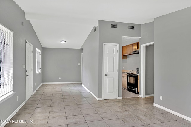 9118 Devonshire Blvd, Jacksonville, FL 32208 - empty room featuring light tile patterned flooring and baseboards