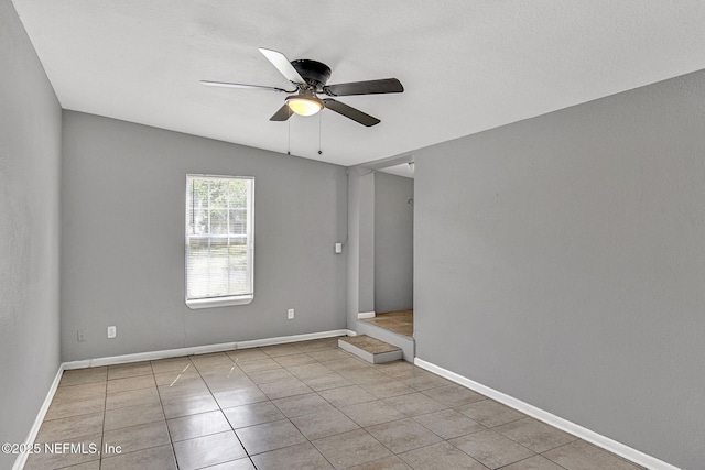9118 Devonshire Blvd, Jacksonville, FL 32208 - spare room featuring ceiling fan, tile patterned flooring, and baseboards