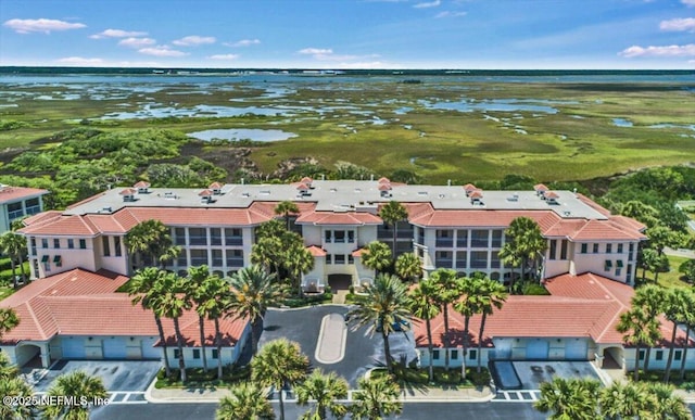 215 S Ocean Grande Dr Unit 105, Ponte Vedra Beach, FL 32082 - bird's eye view of a large body of water and apartment complex / building