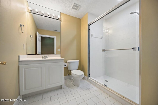 215 S Ocean Grande Dr Unit 105, Ponte Vedra Beach, FL 32082 - full bath featuring toilet, a stall shower, vanity, tile patterned flooring, and a textured ceiling