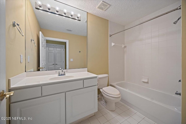 215 S Ocean Grande Dr Unit 105, Ponte Vedra Beach, FL 32082 - full bathroom with toilet, tile patterned flooring, shower / tub combination, vanity, and a textured ceiling