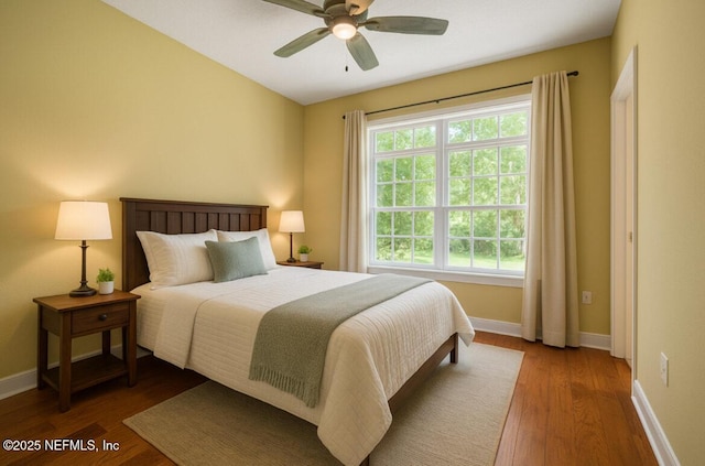 215 S Ocean Grande Dr Unit 105, Ponte Vedra Beach, FL 32082 - bedroom featuring wood finished floors, baseboards, and a ceiling fan