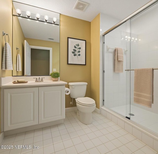 215 S Ocean Grande Dr Unit 105, Ponte Vedra Beach, FL 32082 - full bathroom with toilet, vanity, a shower stall, tile patterned floors, and baseboards