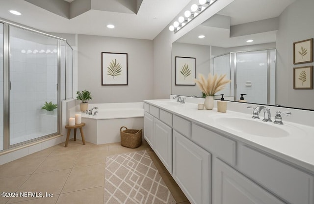 215 S Ocean Grande Dr Unit 105, Ponte Vedra Beach, FL 32082 - full bath featuring double vanity, a stall shower, recessed lighting, a garden tub, and tile patterned flooring