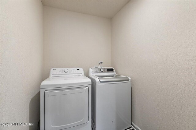 187 Logrono Ct, Saint Augustine, FL 32084 - laundry area with separate washer and dryer