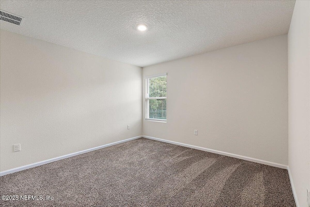187 Logrono Ct, Saint Augustine, FL 32084 - carpeted empty room with a textured ceiling, baseboards, and recessed lighting