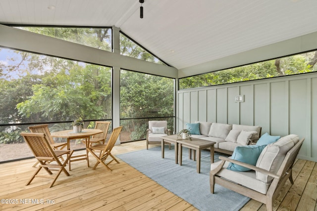 22 N 17th St, Amelia Island, FL 32034 - sunroom with an outdoor living space, lofted ceiling, and outdoor dining space