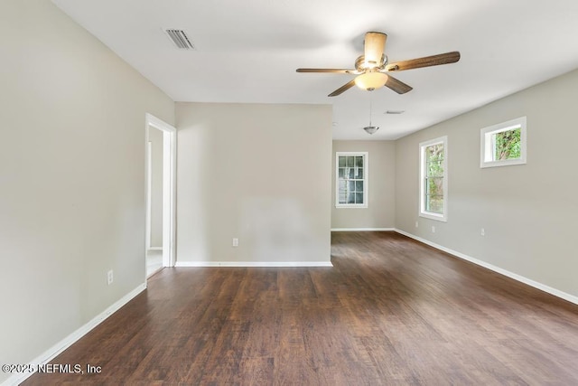 937 Stark St, Jacksonville, FL 32208 - unfurnished room featuring a ceiling fan, wood finished floors, and baseboards