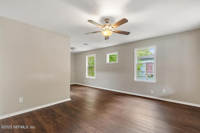 937 Stark St, Jacksonville, FL 32208 - empty room featuring plenty of natural light, ceiling fan, and baseboards
