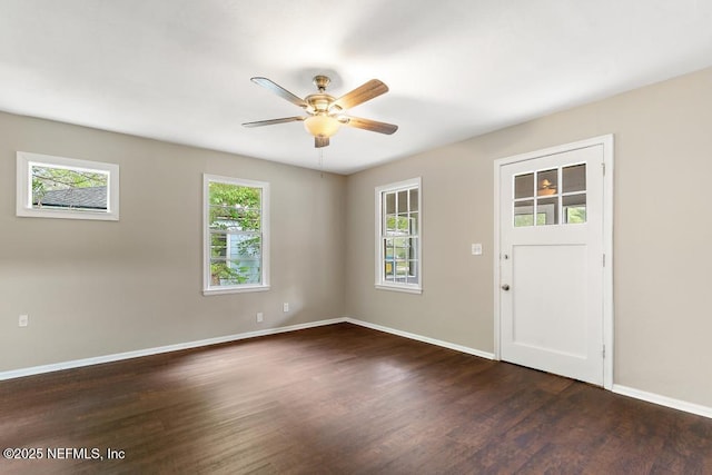 937 Stark St, Jacksonville, FL 32208 - entryway featuring dark wood-type flooring, baseboards, and ceiling fan