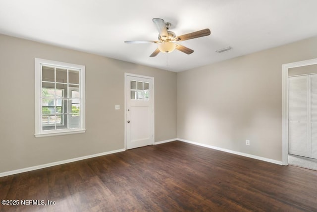 937 Stark St, Jacksonville, FL 32208 - spare room featuring baseboards, ceiling fan, and wood finished floors