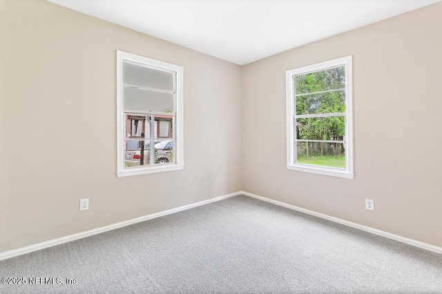 937 Stark St, Jacksonville, FL 32208 - spare room featuring baseboards and carpet floors