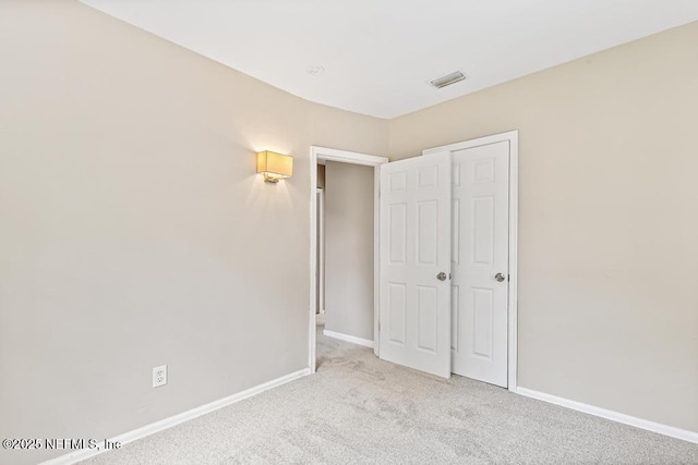 937 Stark St, Jacksonville, FL 32208 - unfurnished bedroom with carpet floors and baseboards