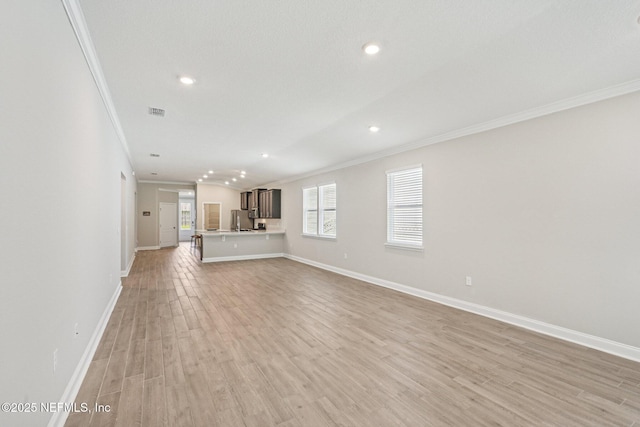 285 Greenway Ln, Saint Augustine, FL 32092 - unfurnished living room with crown molding, baseboards, light wood finished floors, and recessed lighting