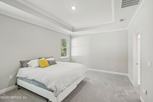 285 Greenway Ln, Saint Augustine, FL 32092 - carpeted bedroom featuring crown molding, baseboards, and a raised ceiling