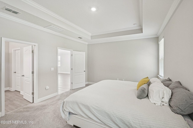 285 Greenway Ln, Saint Augustine, FL 32092 - bedroom featuring crown molding, carpet, a raised ceiling, and baseboards