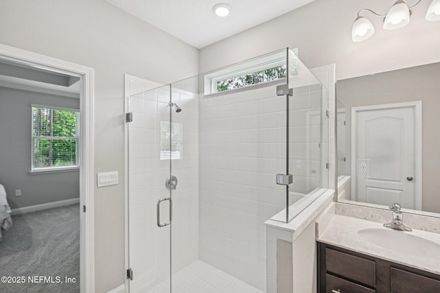 285 Greenway Ln, Saint Augustine, FL 32092 - bathroom featuring plenty of natural light, a shower stall, vanity, and baseboards
